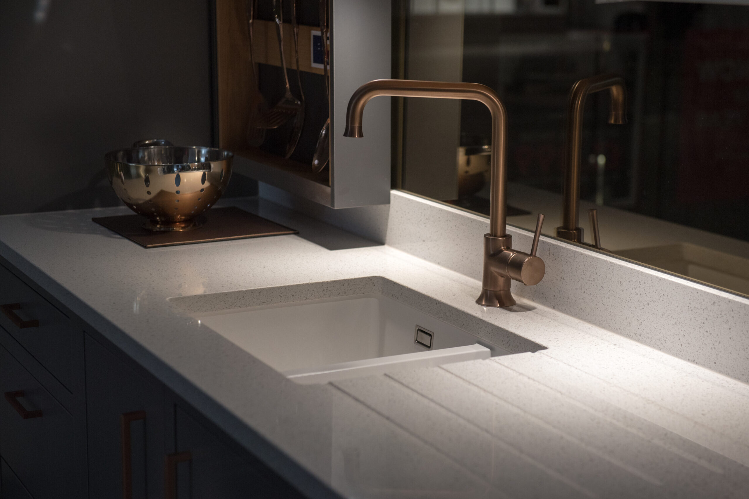 Ceramic Kitchen Wirh Elegant Faucet Tap And Down Lighting