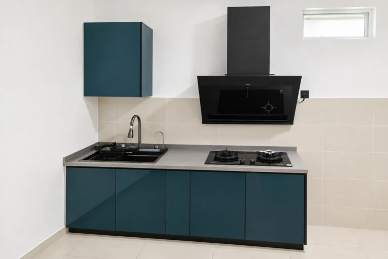 Minimalist Teal Kitchen With Black Appliances